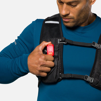 color:Ribbon Red||view:sku image back||seo:Nathan StrobeLight 2.0 Safety LED Light Clip - Ribbon Red - On Model - Clipping On StrobeLight to Hydration Vest