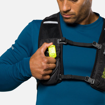 color:Safety Yellow||view:sku image back||seo:Nathan StrobeLight 2.0 Safety LED Light Clip - Safety Yellow - On Model - Clipping On StrobeLight to Hydration Vest