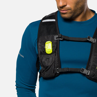 color:Safety Yellow||seo:Nathan StrobeLight 2.0 Safety LED Light Clip - Safety Yellow - On Model - Detail View of StrobeLight Attached to Vest